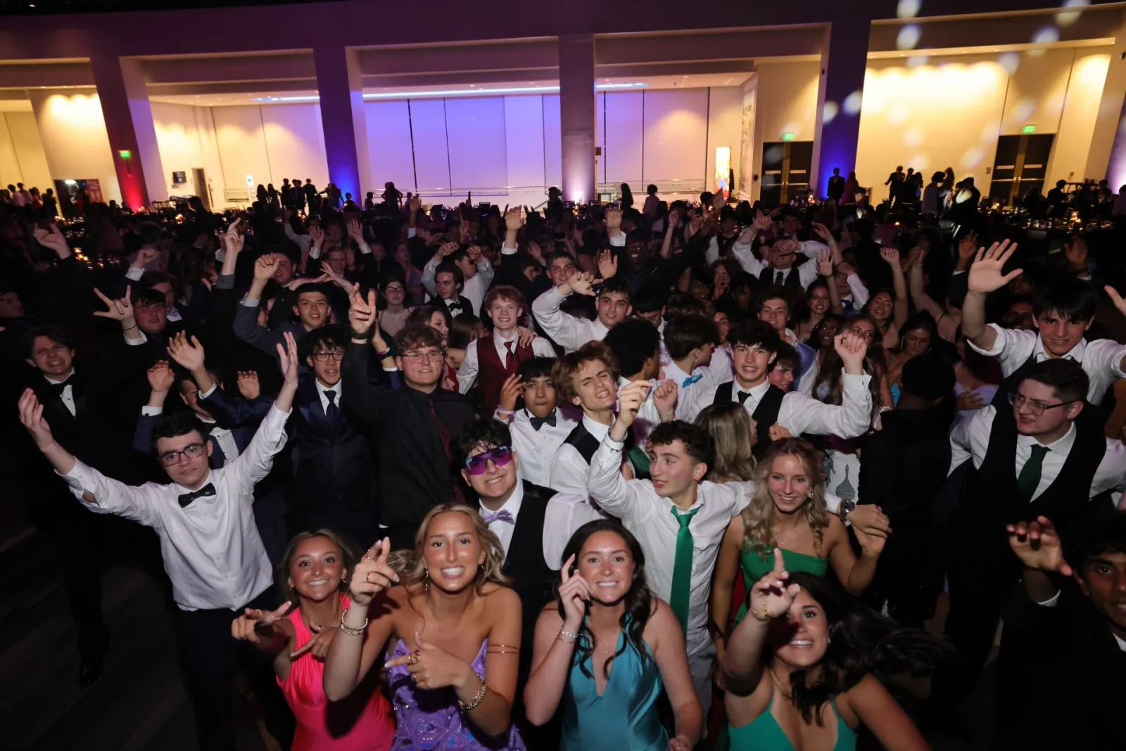 Seniors celebrating on the dance floor at the 2024 Shaker Senior Prom at the Albany Capital Center