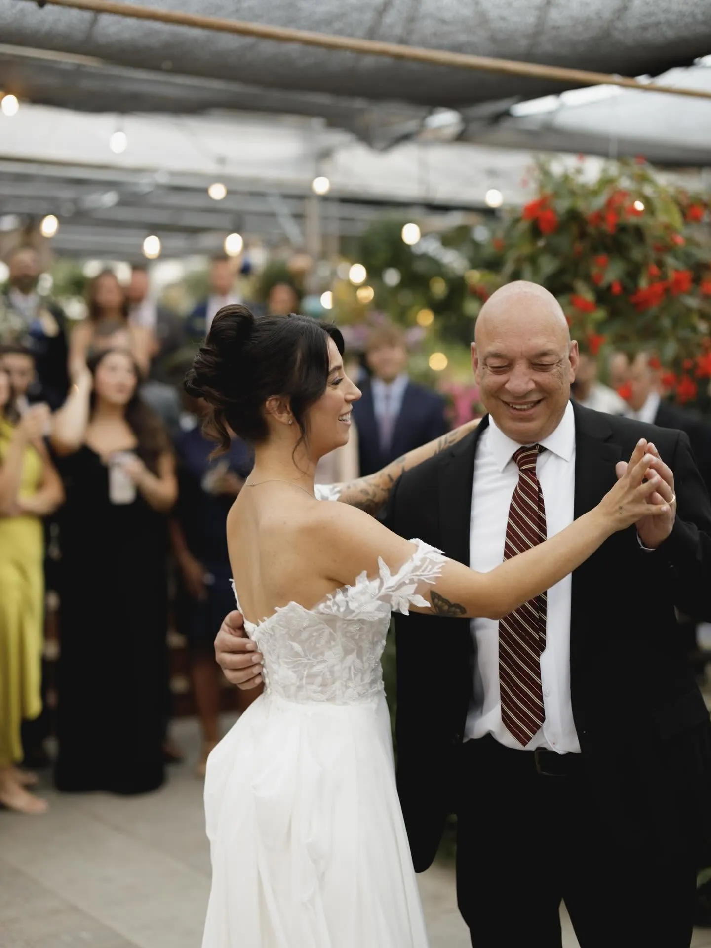 Father-daughter dance at a greenhouse wedding reception in the Capital Region