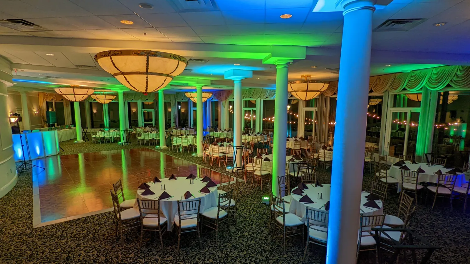 DJ booth and uplighting at an Albany Country Club wedding reception